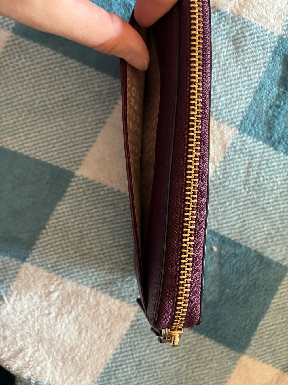 kate spade plum/burgundy zip-around card wallet with gold logo